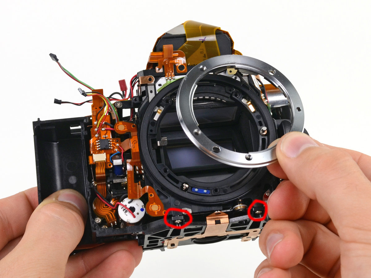 Сервисный ремонт фотоаппарата canon. Nikon-d800-DSLR-Camera-Teardown. Разобранный фотоаппарат. Объектив в разборе. Объектив камеры.