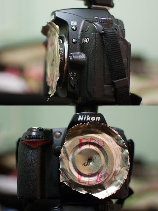 Pinhole view on camera. Tin can lens