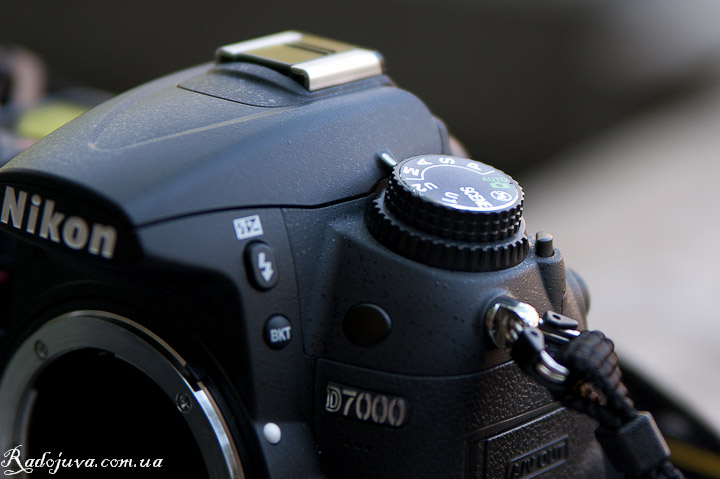 Review of the Nikon D7000 body. Redesigned shooting mode selector.